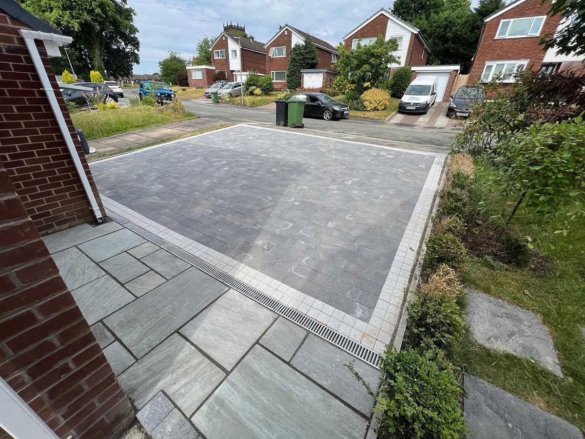The same driveway finished with block paving and a sandstone border